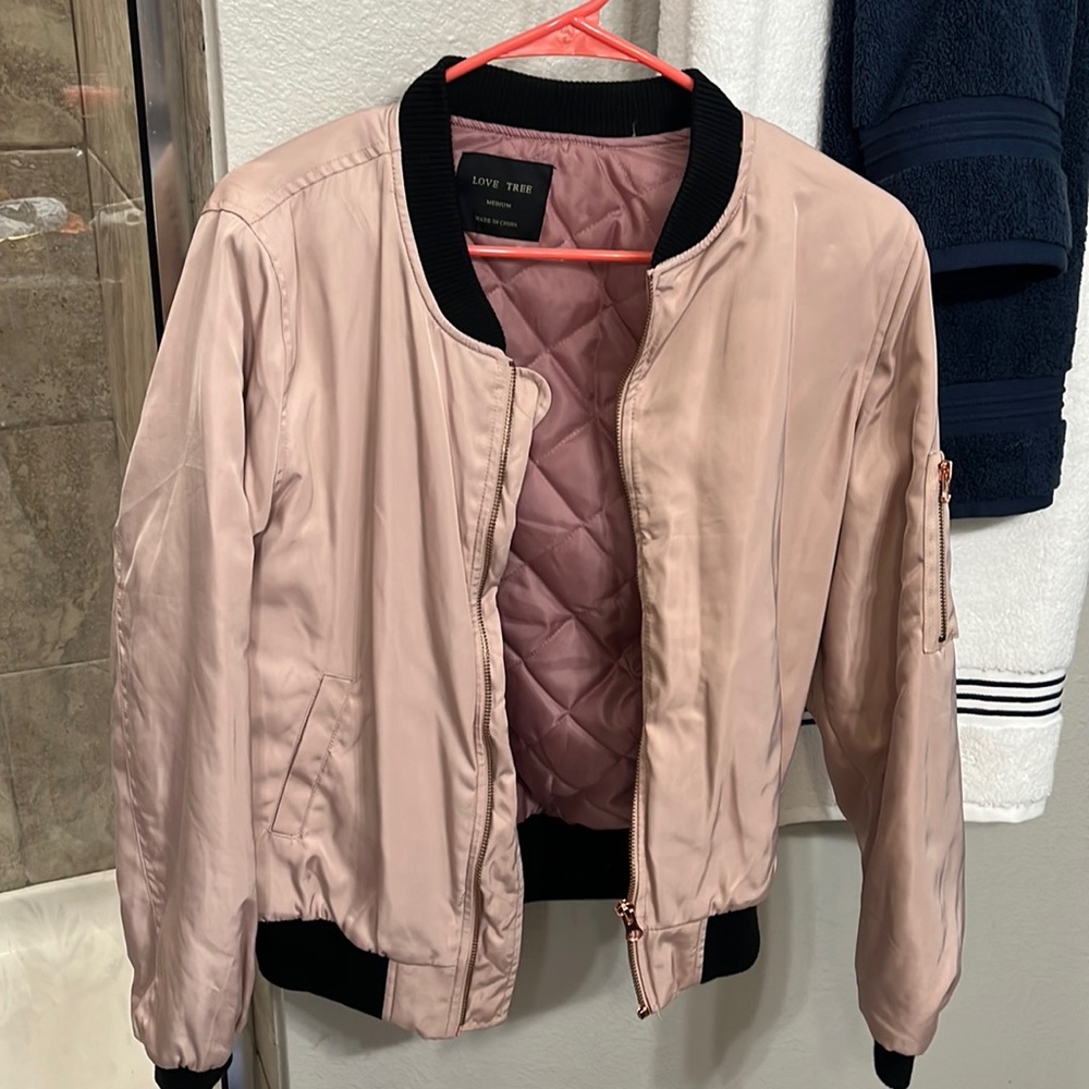 Rose gold puffy jacket never worn great condition